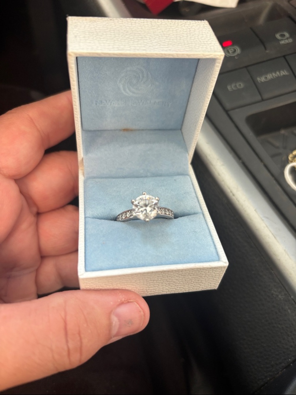 Cubic ring set in 14 kt white gold